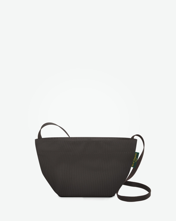 Hervé Chapelier -  - 
"Packshot of a 1927N shoulder crossbody bag
with a long handle in polyamide webbing and a zipper.
The bag is made of solid nylon in an extra-small size.
Mini sac bandouliere epaule fond carre uni taille XS"
