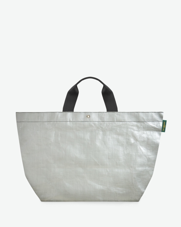 Hervé Chapelier -  - "Packshot of a 2014PP market tote bag
with short polyamide handles and a rectangular bottom.
The bag is made of polyethylene in a large size.
Sac cabas marche a poignees courtes en polyethylene format L"