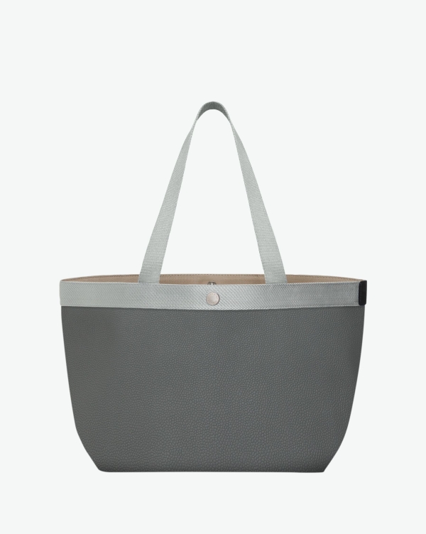 Hervé Chapelier -  - "Packshot of a 708GP shopping bag rectangular bottom
with short polycotton handles and webbing and a snap button.
The bag is made of pebbled grain coated canvas.
Sac cabas a poignees courtes en toile enduite format L"